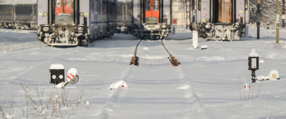 RAIWAY SIDING -  Winter weather over the wagons and train infrastructure 
