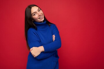 Fototapeta premium Photo of beautiful positive smiling adult woman wearing stylish clothes standing isolated on colorful background with copy space looking at camera