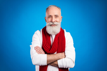 Photo of cute attractive age gentleman wear white sweater red scarf arm crossed smiling isolated blue color background