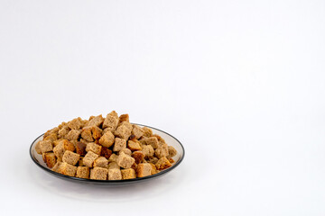 rye crackers in a plate on a white background
