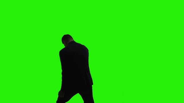 A man dancing on green screen. 