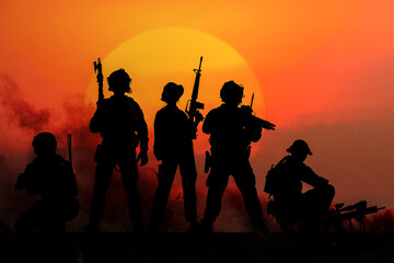 The silhouette of a military soldier with the sun as a Marine Corps for military operations - 459101134