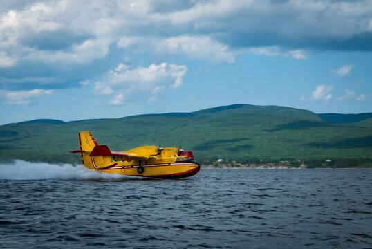 Canadair CL-415 water bomber  working to extinguishe a forest fire in eastern Quebec, Canada.