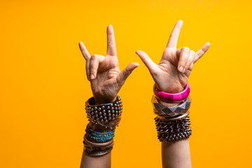 Hand gestures. Thumbs up, that's a cool gesture of the rocker.