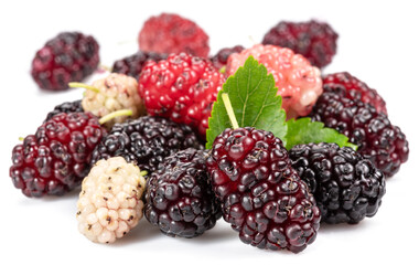Ripe black mulberries fruits with green leaves isolated on white background.