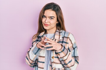 Young caucasian girl wearing casual clothes hands together and fingers crossed smiling relaxed and cheerful. success and optimistic