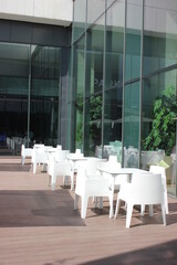 chairs in the mall on the veranda in the sun