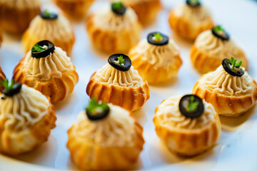 canapes, tartlets with pate and salad. delicious and simple snacks