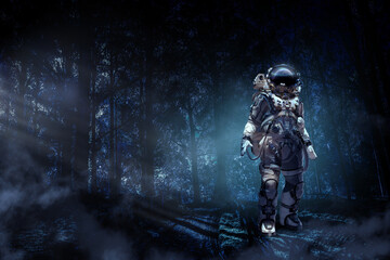Fototapeta premium Astronaut walking on an unexplored planet