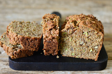 Diet baked goods made from whole grain flour and nuts. Wood background