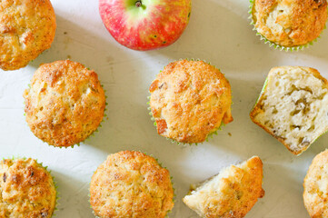 Sweet dessert apple muffins with cinnamon and nuts. White background. Horizontal