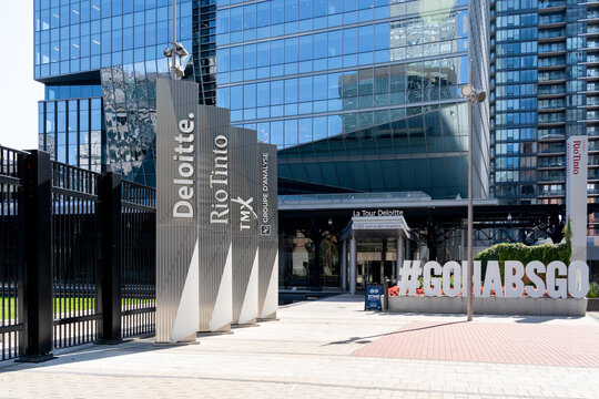 Montreal, QC, Canada - September 4, 2021:  The Company signs  Deloitte, RioTinto, Tmx and Groupe d'analyse in front of Deloitte Tower in Montreal, QC, Canada. 