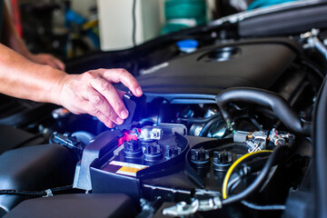 Fototapeta na wymiar Check and maintenance the battery in car with yourself. Service and maintenance car or vehicle.