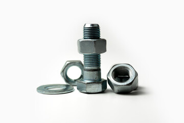several large bolts and nuts on a white background