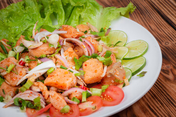 Fototapeta na wymiar Raw salmon salad in Thai style flavor