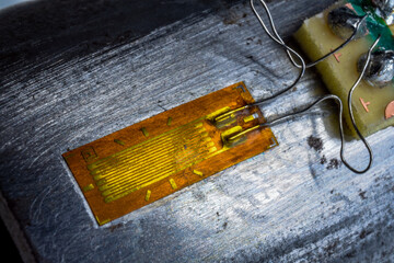 Close up view of an engineering strain gauge - obrazy, fototapety, plakaty