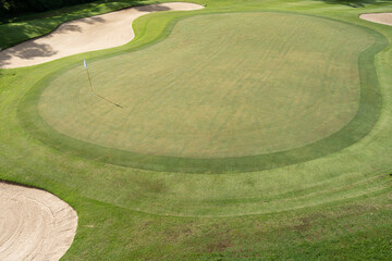 putting green golf course with sandpit