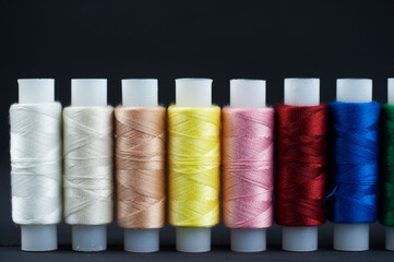 thread palette on a black background
