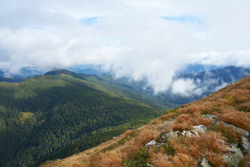 Amazing cloud in the mountains next to you. Autumn in mountains