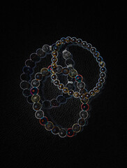 diamond necklace on black background