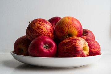 Honeycrisp apples against white background without retouching skin.