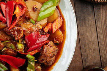 Closeup on chinese national dish dapanji with stewed chicken and potato