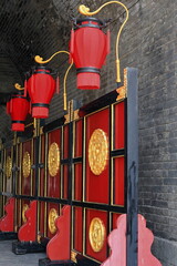 Unlit red lanterns-red gold black panels-Zhenglou Tower tunnel-Yongning.South Gate-CityWall. Xi'an-China-1590