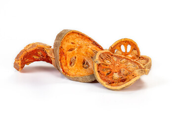 dried bael fruit on a white background,isolated