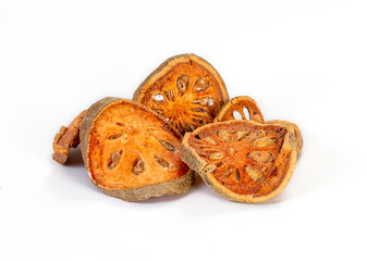 dried bael fruit on a white background,isolated
