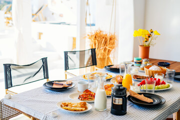 Breakfast table served on luxury villa