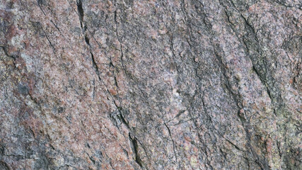 Granite stone surface texture. Texture of rough granit stone surface background. Abstract background from natural material