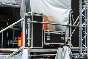 Concert equipment in metal boxes. Preparing for public events in the open air.