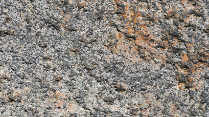 Granite surface. Texture of granite stone. Cracked natural stone surface. Copy space
