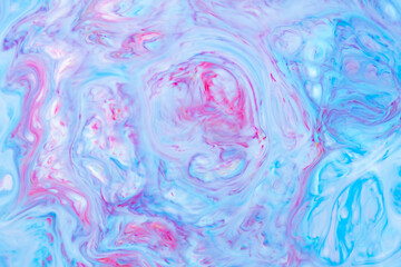 Fototapeta premium Fluid Art. Abstract liquid paint textured background with decorative spirals and swirls. Liquid pink blue backdrop. Trendy wallpaper