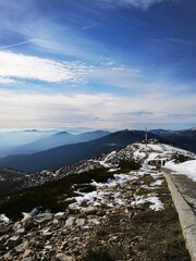 hiker on the top of the snowy mountain