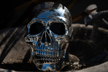 Metallic human skull closeup. Horror Halloween concept.