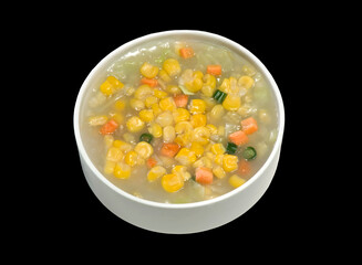 Creamy Corn soup with fresh mixed vegetables in a bowl 