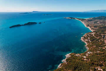 Fototapeta na wymiar Aerial drone view to seascape with clear blue water. Amazing azure Mediterranean coast background. Travel destination, universal nature, resort, summer vacation. 