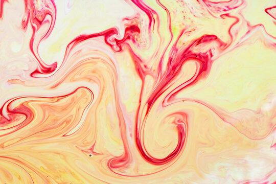 Abstract yellow-red background. Abstract paint ink, psychedelic background. Fluid art © Lazartivan