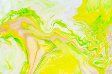 Fototapeta na wymiar Abstract yellow-green liquid background. Green paint pattern with cyclical swirls. Trendy wallpaper. Eco concept