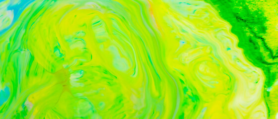 Abstract yellow-green liquid background. Green paint pattern with cyclical swirls. Trendy wallpaper. Eco concept