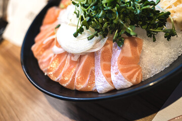 Salmon sashimi on ice, Japanese food izakaya style