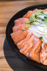 Salmon sashimi on ice, Japanese food izakaya style