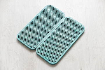 Blue sadhu board made of wood with nails. View from above. Light floor