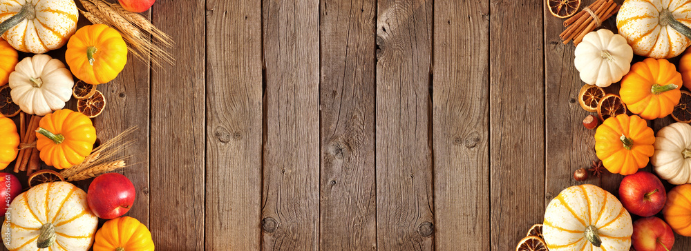 Aufkleber fall double side border of pumpkins, apples and spices. above view on a rustic dark wood banner back
