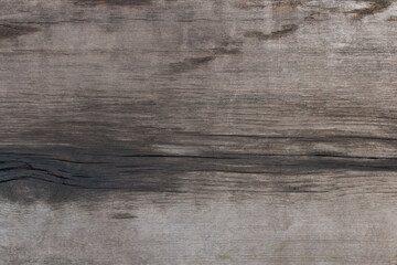 Dark old weathered, wooden texture as background. Rotten wood.