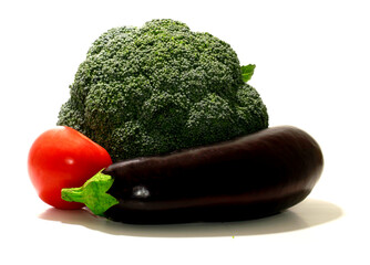eggplant, tomato, cabbage the isolated white background. Vegetable cultures - the agricultural vegetable plants which are grown up by the person 