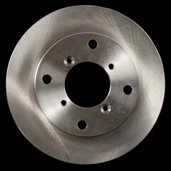 Ventilated car brake disc, isolated on black background