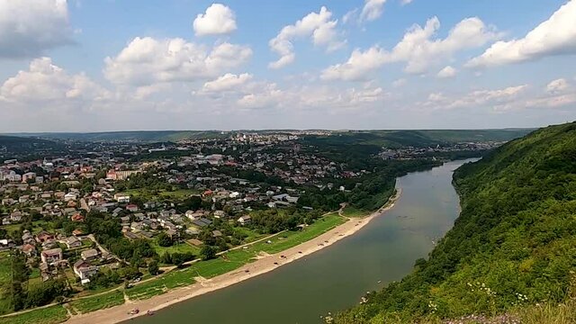 Panoramic view of the summer Dnister river bend canyon and famous Ukrainian Zalischyky town. Ternopil region, Ukraine, Europe.