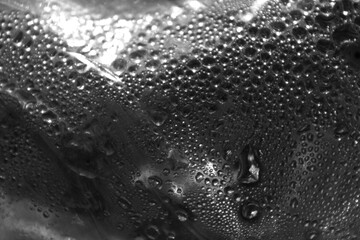 Grey background. Drops of water on the surface. Abstract gray background.